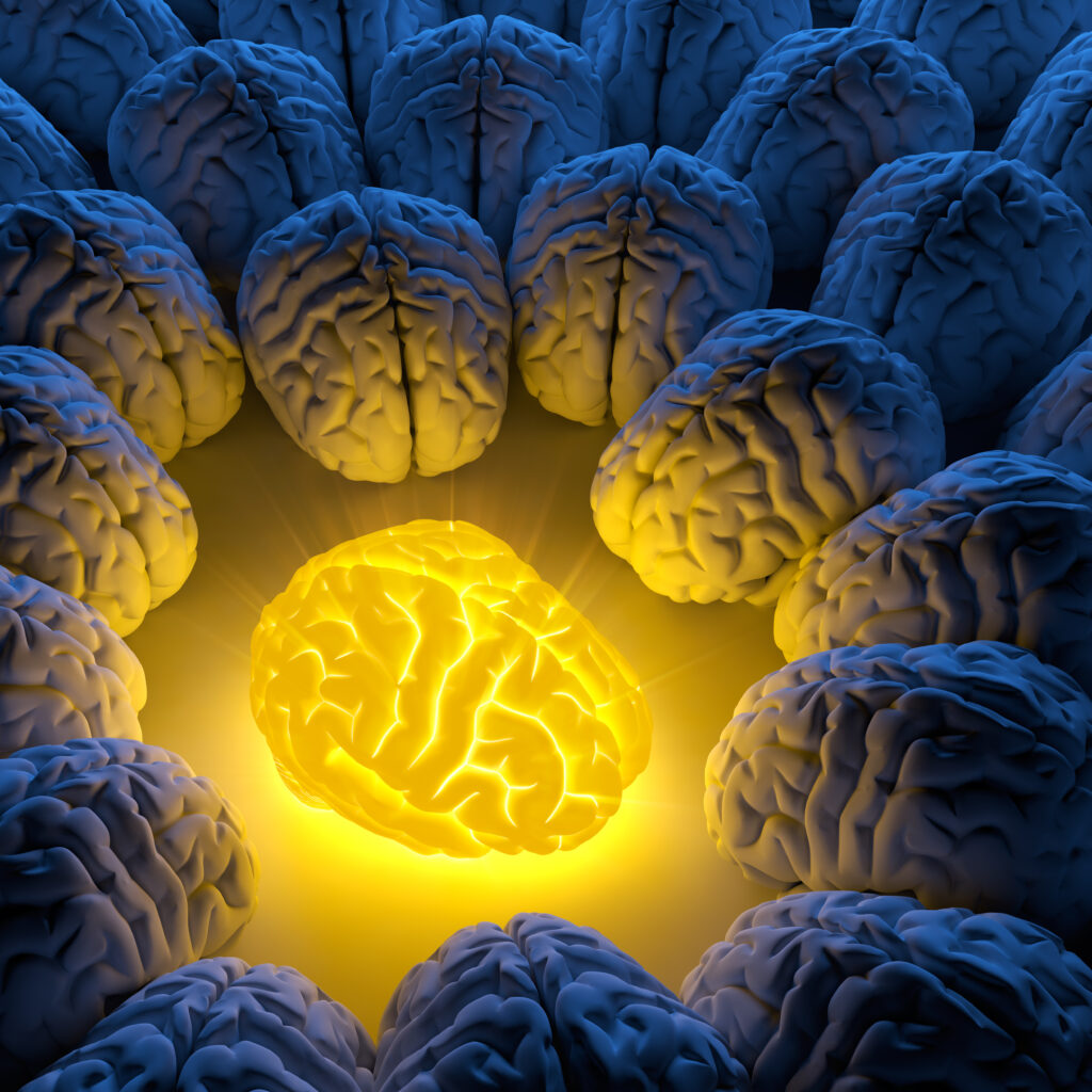 The concept of a unique intelligence and original idea - a brain emits luminous energy, and ordinary brains gathered around